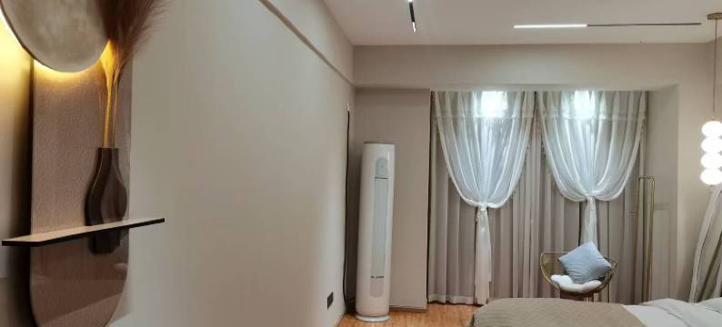 漫岛遇见民宿(万达广场店)图片