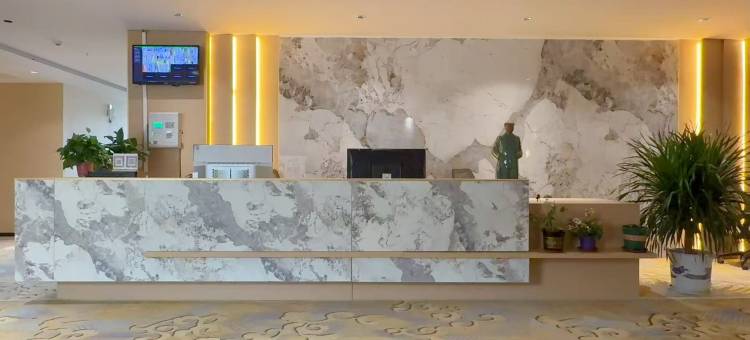 鸣悦凯会观光酒店图片