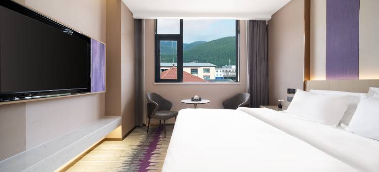 新天银酒店(客运中心店)图片