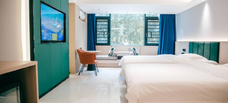 雨林居酒店(西双版纳勐腊客运站店)图片