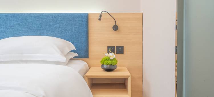 悦森·禧致酒店(城市中心广场老达一中店)图片