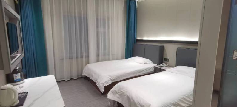 宜世宜嘉主题宾馆公寓(齐齐哈尔站前南大街店)图片