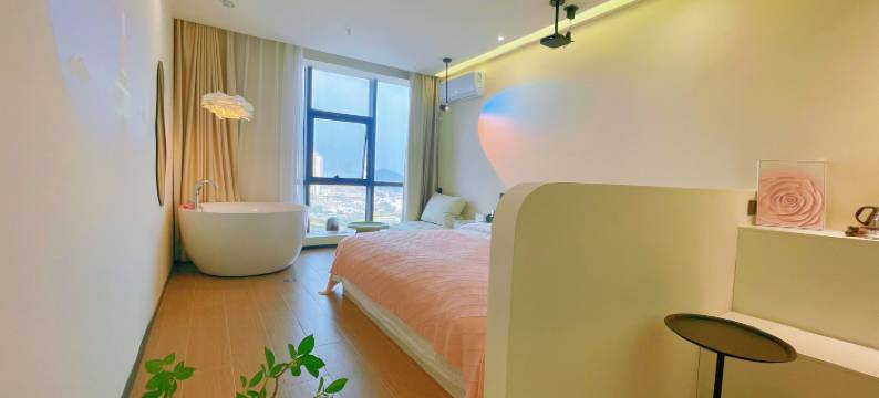 山茶花·艺术酒店(花溪大学城店)图片