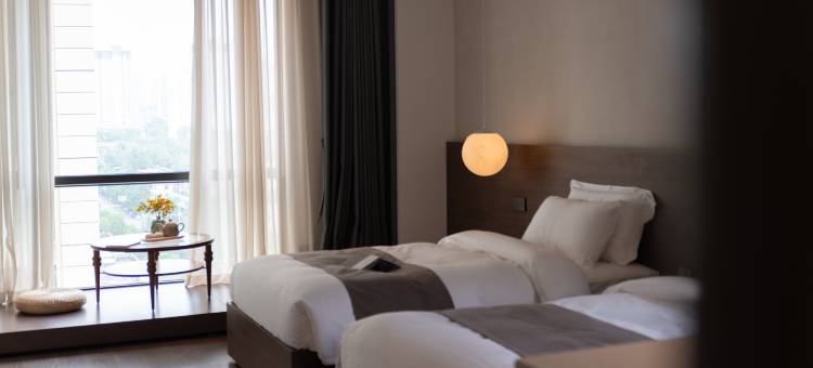 瑞恩民宿酒店(洛阳牡丹广场地铁站万达广场店)图片