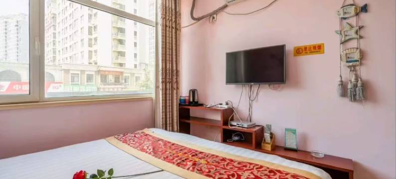 青岛心情假日主题宾馆图片