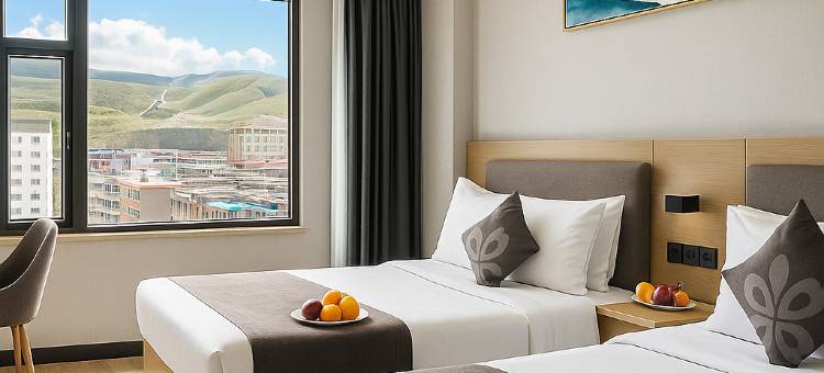 花美时酒店(白塔公园甘孜古镇店)图片