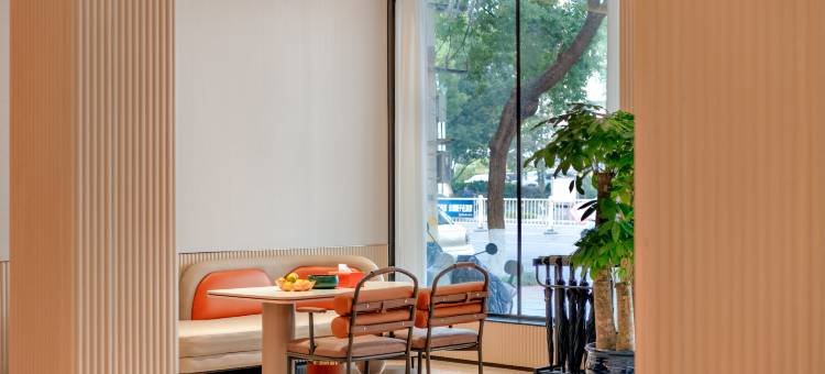 金桔酒店(联盛快乐城火车站店)图片