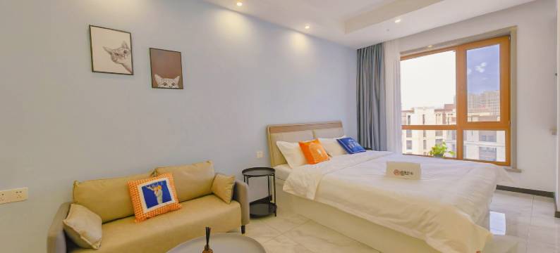 暖幢·艺术城宿(哈尔滨西站万达广场店)图片