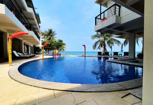 Sunset at Aninuan Beach Resort powered by Cocotel Hotel Overview