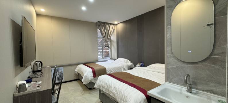 哈尔滨兄弟时钟宾馆(黑工程大学交通学院地铁站店)图片