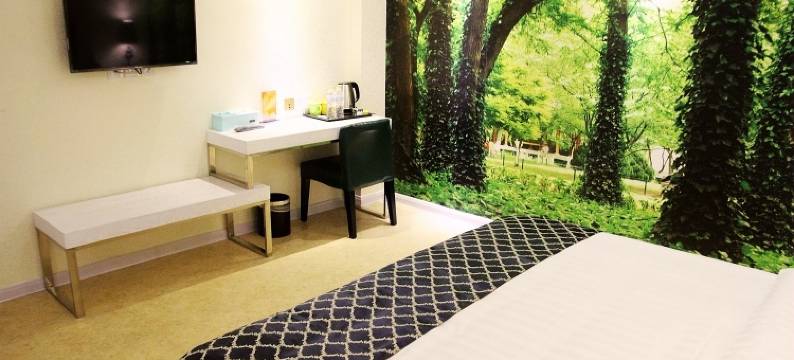 东海岸宾馆(青岛火车站团岛地铁站店)图片