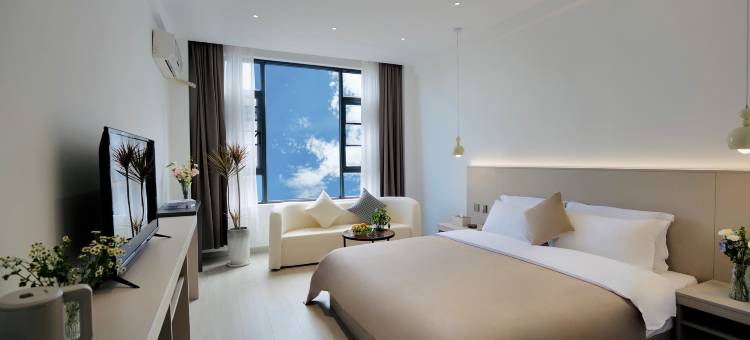 大理屋里请客栈(兴盛大桥洱海月湿地公园店)图片