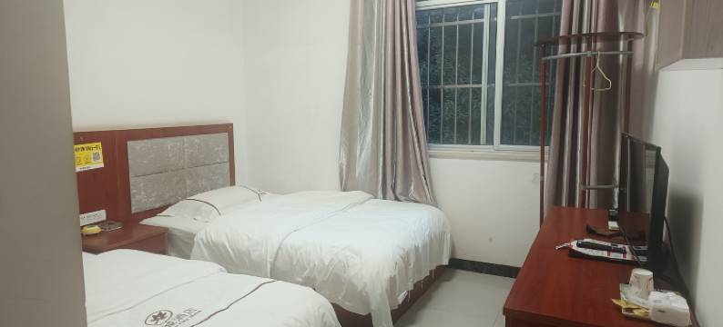 彝良秋城酒店图片