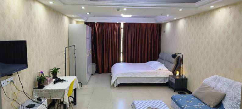 东篱青年旅舍(信阳火车站天润广场店)图片