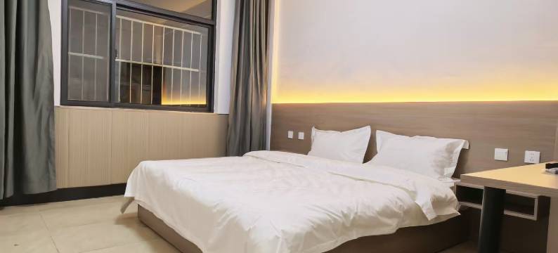 再寓美客酒店(泰山火车站店)图片