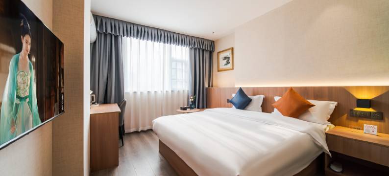 曼客阳光酒店(四川护理职业学院万达广场店)图片