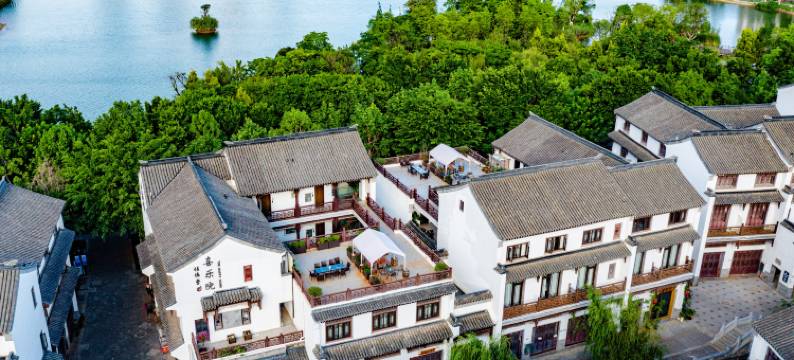 弥勒喜乐院酒店(湖泉水乡旅游度假区店)图片