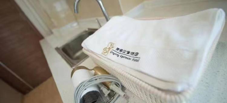 青藤公寓式酒店(威海火车站韩乐坊美食街店)图片
