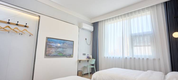 艺龙安云酒店(商丘高铁站第四高级中学店)图片