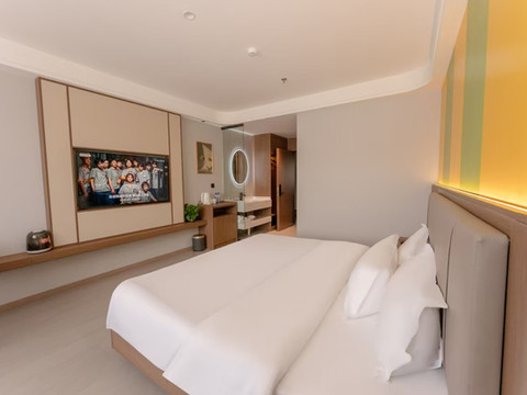 德曼商务酒店(扎兰屯火车站发达广场店)