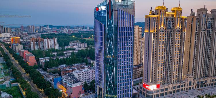 信阳圣达酒店(火车站店)图片