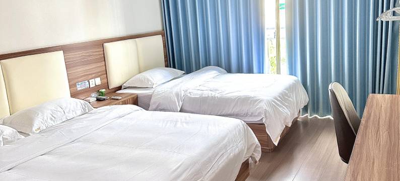 东兴海城商务酒店图片