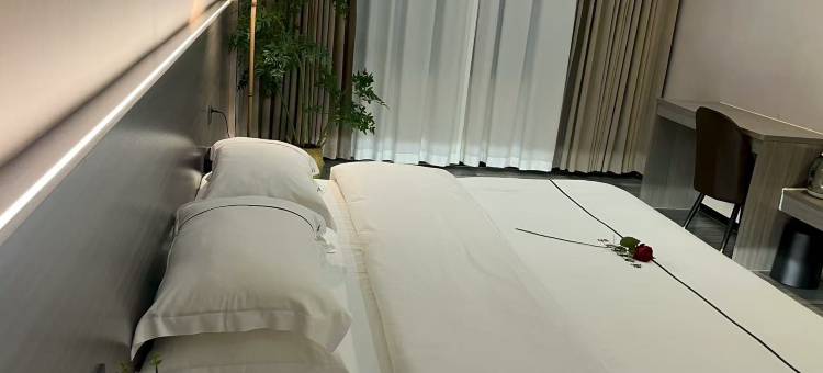 镇康明都商务酒店图片