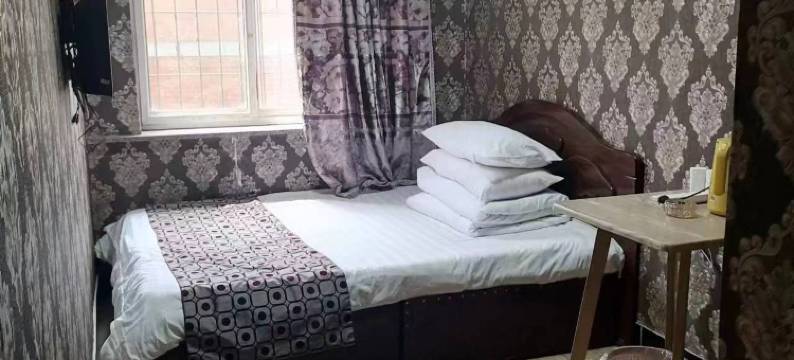 晚城宾馆(抚顺北站店)图片