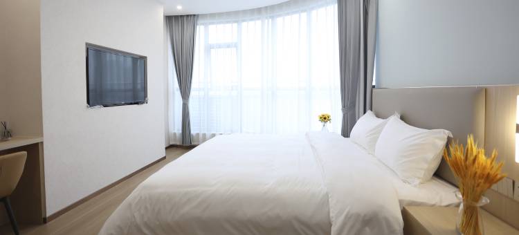 O_W桔子周酒店(南县人民医院店)图片