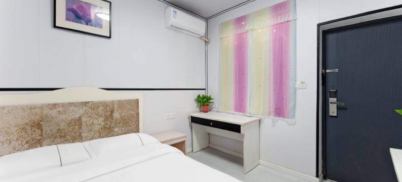巷往旅馆(郑州大学第一附属医院河医院区店)图片