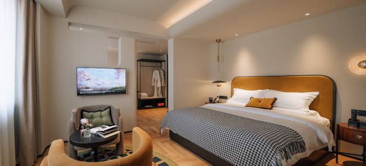 曼夕艺宿(乐山高铁站嘉兴路美食街店)图片