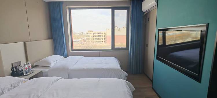 星橙酒店(巴彦淖尔维多利摩尔城店)图片