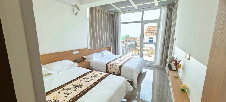 Slowly海岸·日照墅海民宿 (日照海滨国家森林公园店)图片