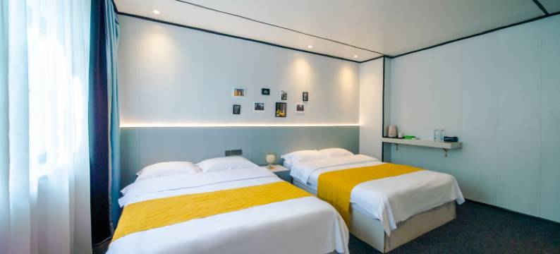 北海银滩逸龙影音酒店(国际客运港码头店)图片