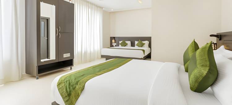 特里博日出酒店，距离圣雄甘地公园5分钟(Hotel Sunrise Luxury Stays)图片