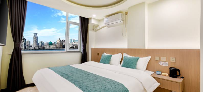 亿佳宾馆(长春红旗街这有山店)图片