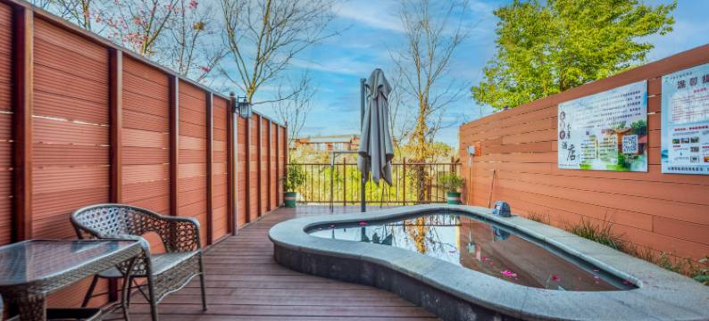 石林石泉村木屋酒店图片