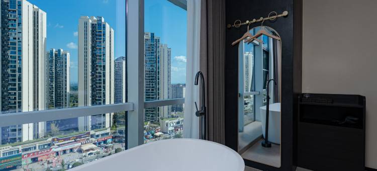 四季酒店(康建城西南医科大学附属医院店)图片