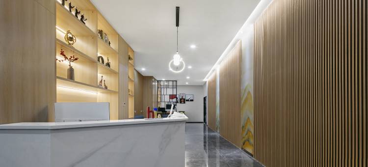 乐橙·轻雅酒店(岗李比亚迪工厂店)图片