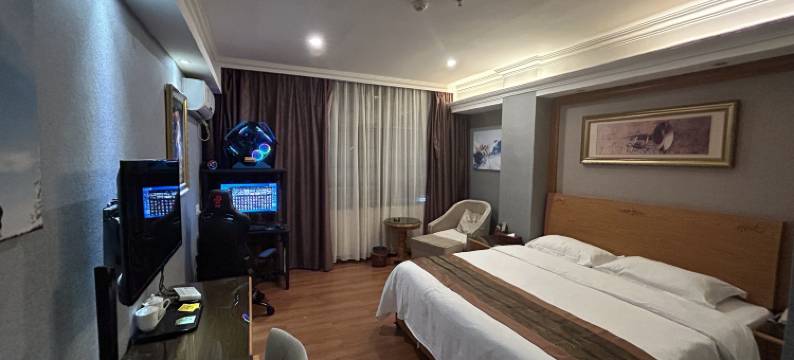 亚信电竞酒店(深圳坪地宜城PARK沃尔玛店)图片