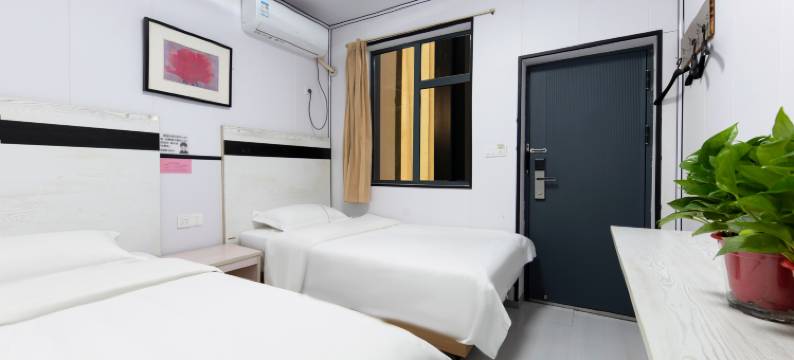 巷往旅馆(郑州大学第一附属医院河医院区店)图片