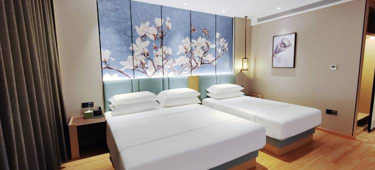 白玉兰商务酒店(龙江志刚广场店)图片