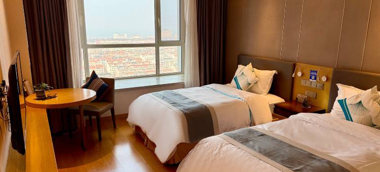 万如One room轻奢酒店(烟台金沙滩海水浴场店)图片