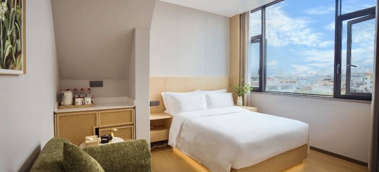 犀鸟谷假日酒店(芒市广场店)图片