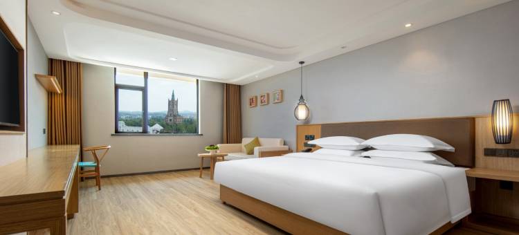 曼居酒店(丰城爱情花卉小镇店)图片