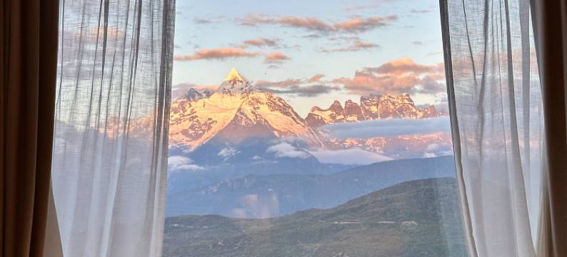 德钦梅里观云伴山·雾浓顶图片