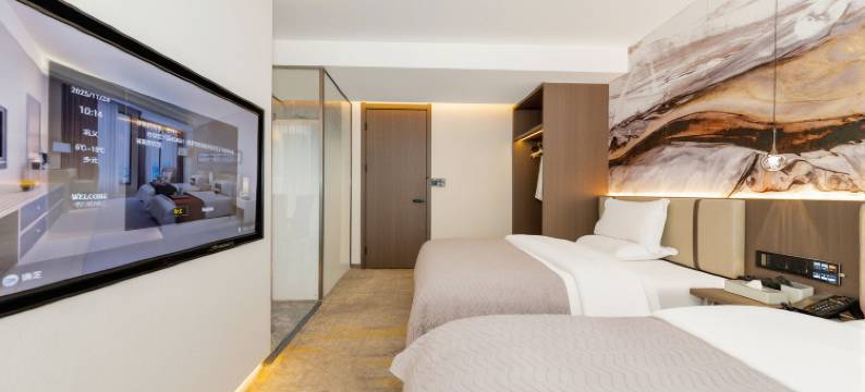 富怡嘉智能酒店(巩义站星月时代广场店)图片