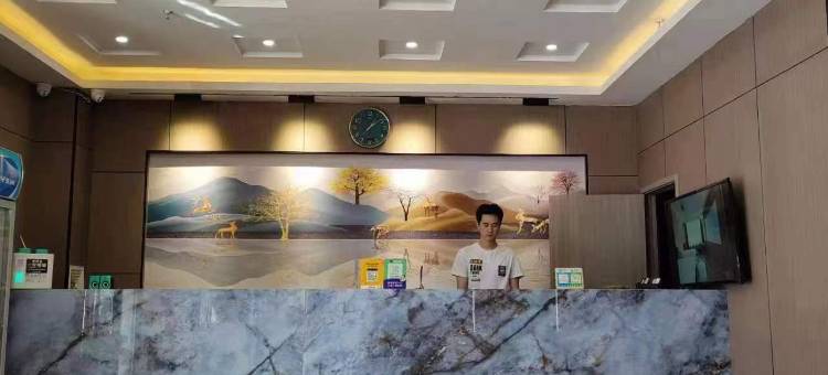 长春芒果宾馆(上海路万达广场活力城店)图片