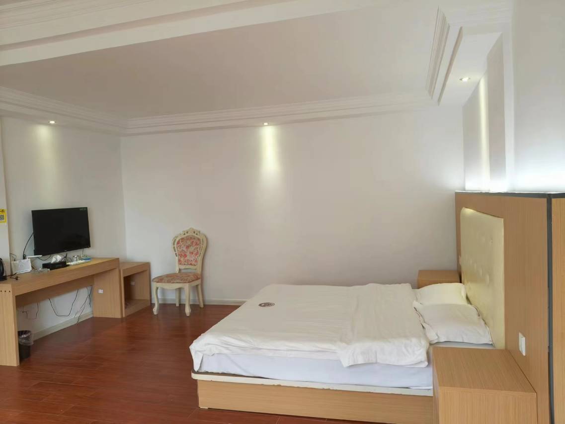 武宣威泥斯大酒店