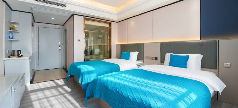 万华逸居酒店(于都站店)图片